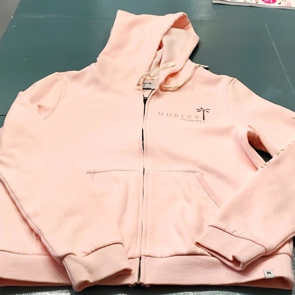 Hurley pink woman's hoodie.  Size small.‎ Very good used condition. Zip up.
